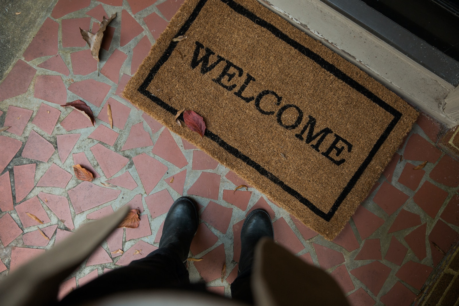 brown and beige welcome area rug